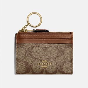 Mini Skinny Id Case In Signature Canvas